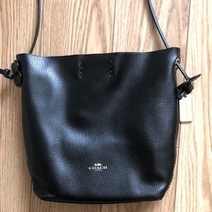 Coach- Small Leather Bucket bag with magnetic button closure